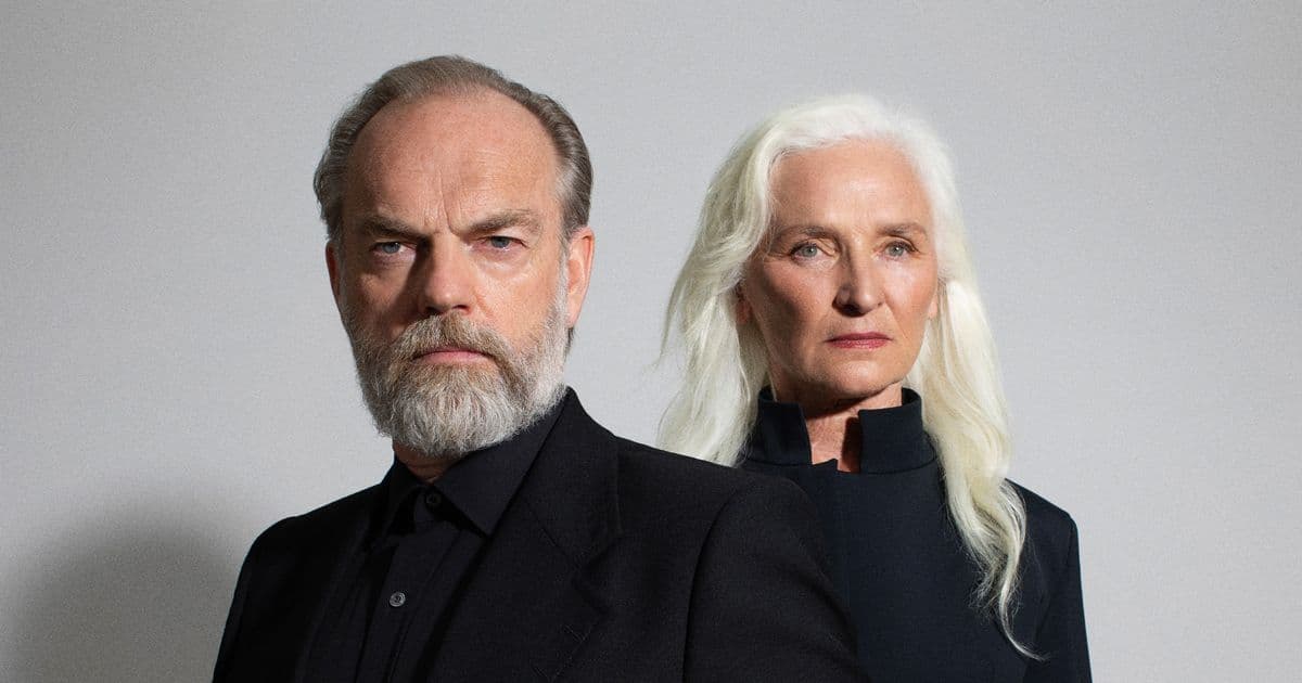 Hugo Weaving. Olwen Fouéré. Older man and woman wearing black.