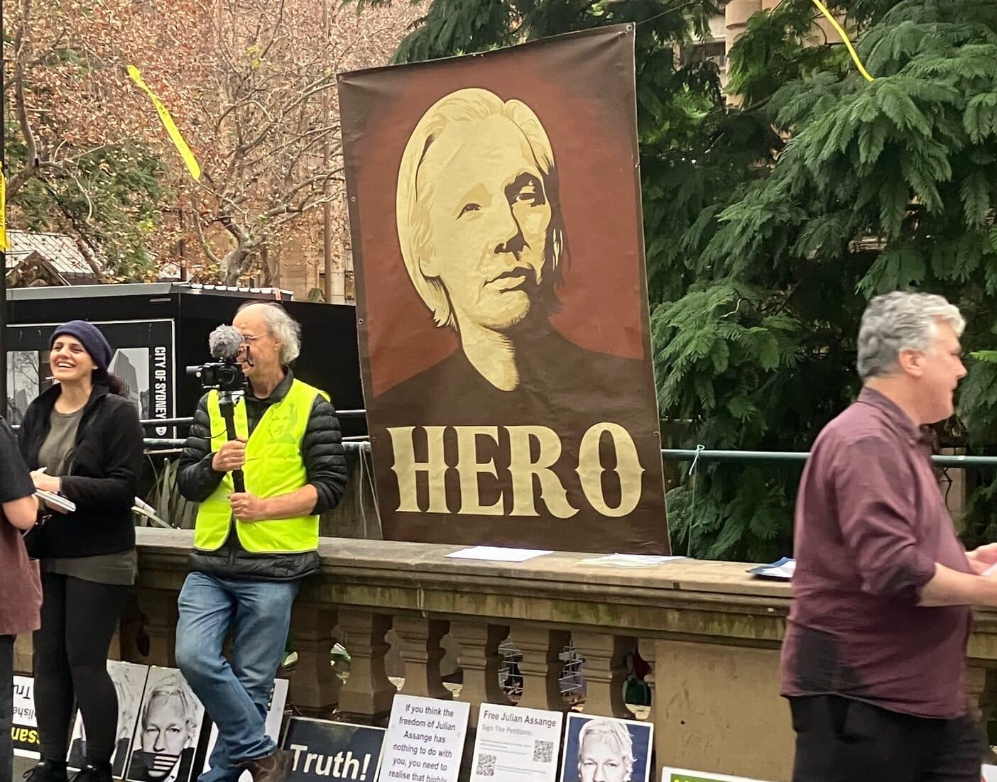 Julian Assange flying to Canberra