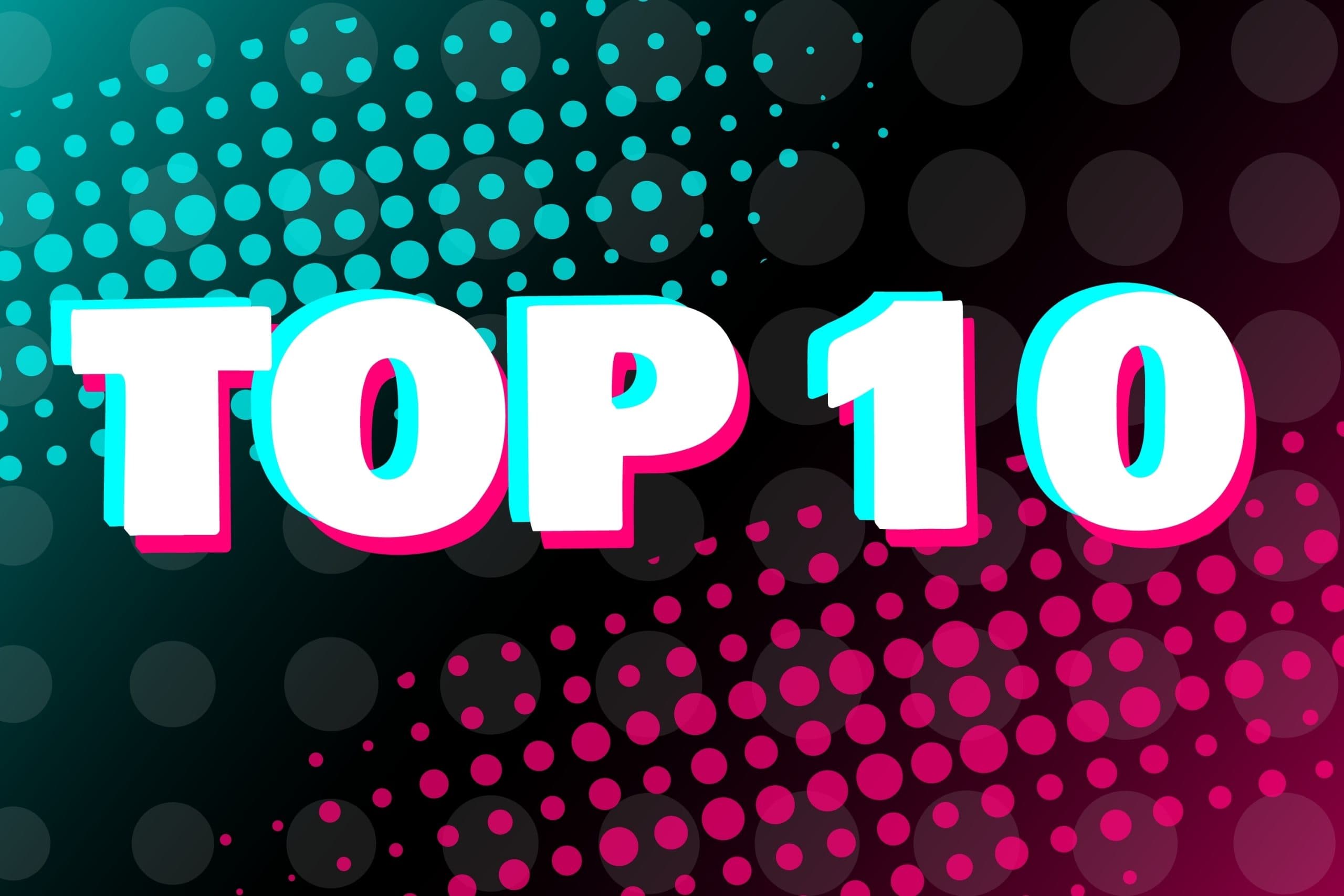 The words Top Ten on an abstract colourful background of black with turquoise and magenta spots.