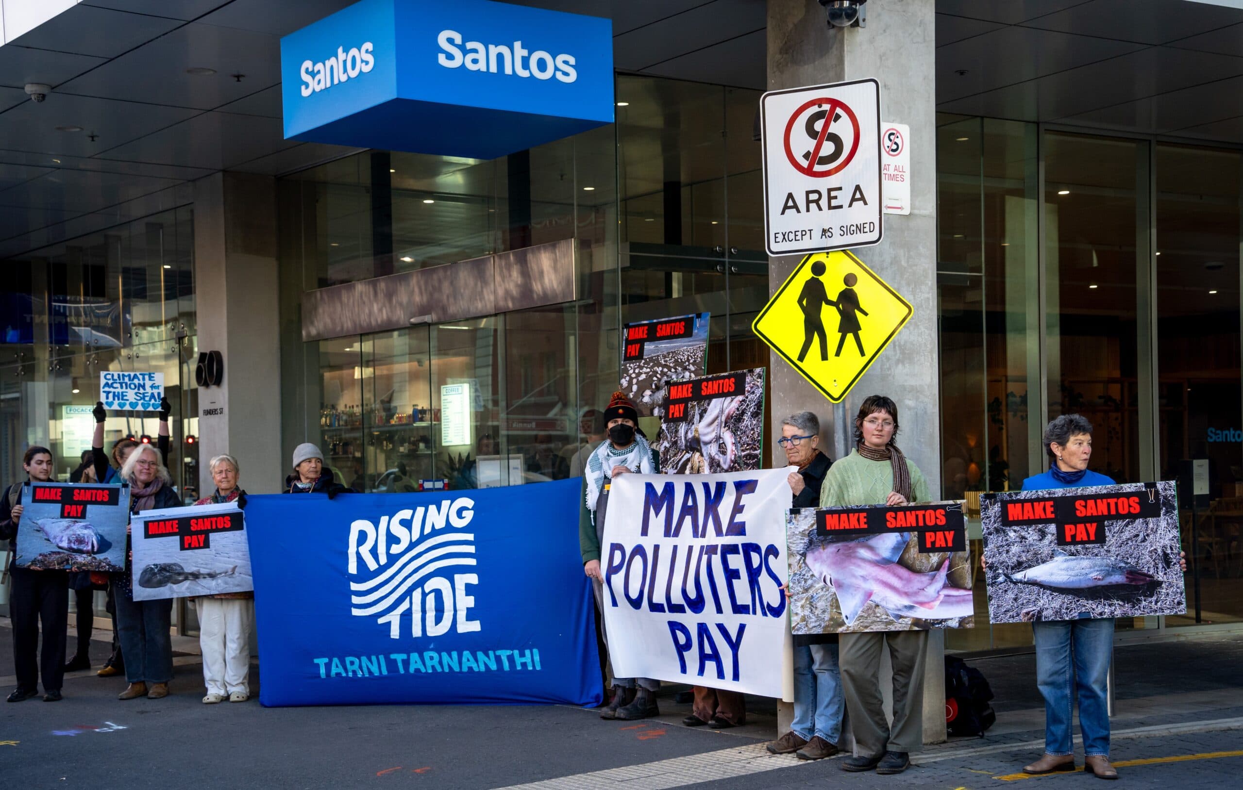 Protests call for gas giant to pay up amid algae bloom outbreak
