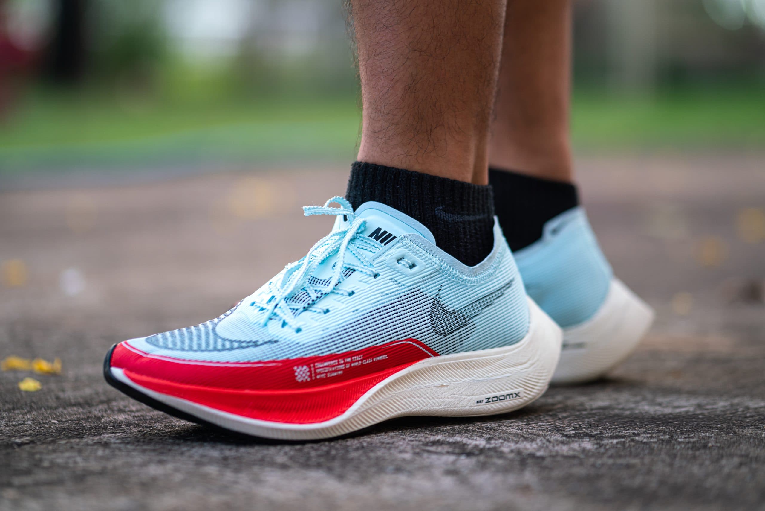 a runner wearing nike "zoomx vaporfly next" shoes