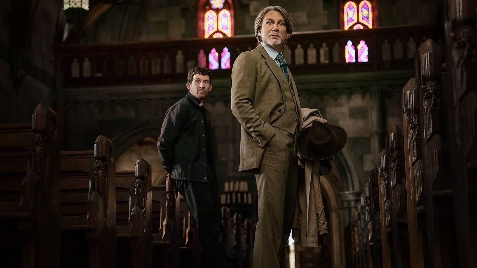 an image of daniel craig as benoit blanc in wake up dead man, alongside co-star josh o'connor